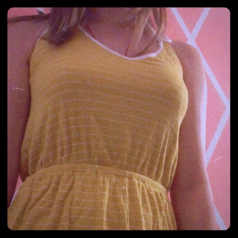 Yellow + white striped halter top romper.